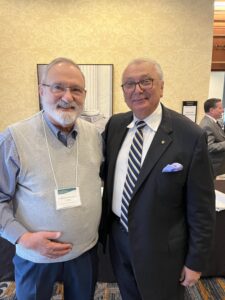 Branko Terzic with Enrique Bacalao Former Wisconsin PSC economist together at SURFA 55th Annual Conference in Richmond VA April 11, 2024