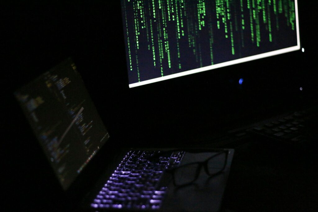 A laptop computer sitting on top of a desk