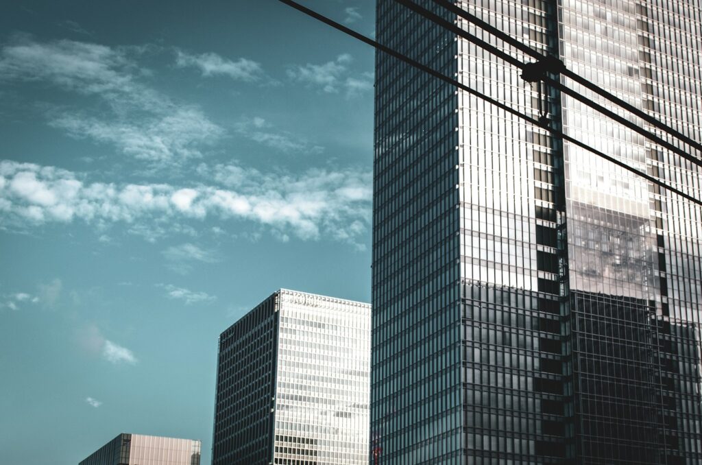 blue and white concrete building under blue sky during daytime